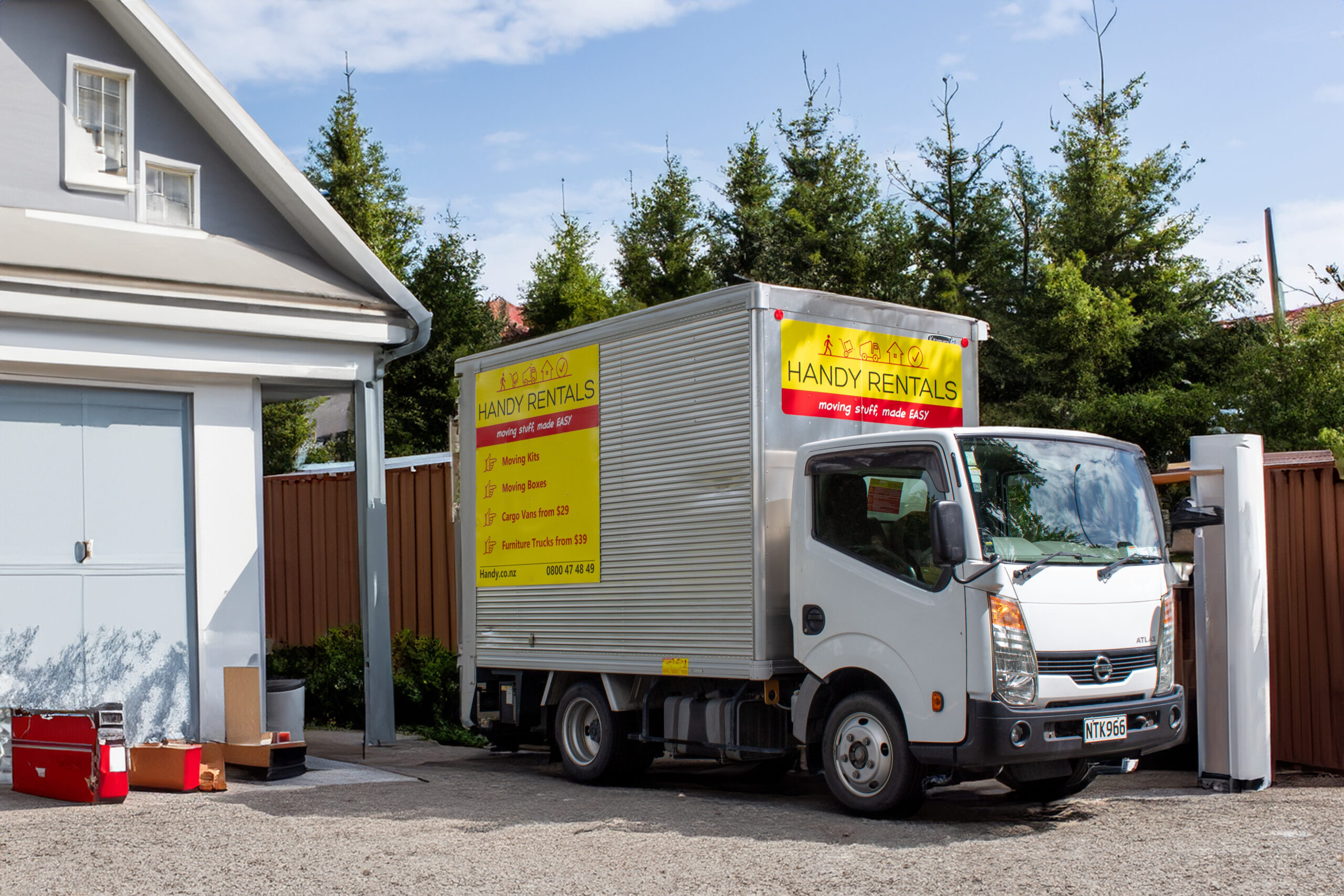 handy rentals truck parked outside a new zealand home
