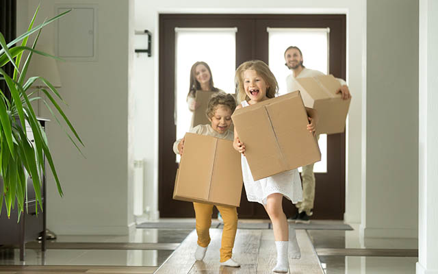 family moving into their new home.
