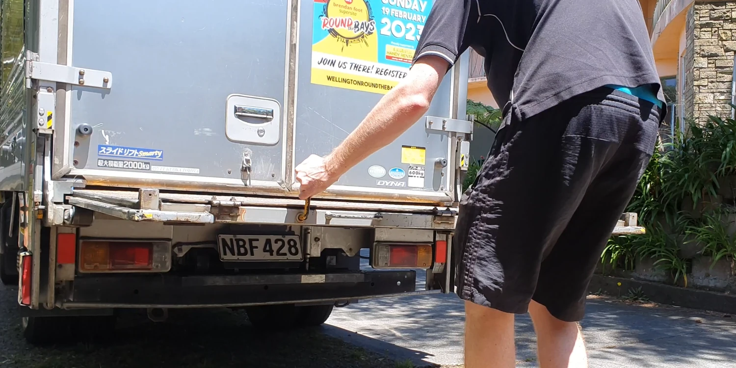 Pulling out a slide away tail lifter on a box truck.